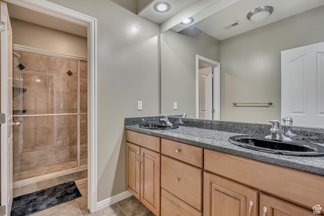 11743 S Silver Spur Ln, Draper, UT 84020 - bathroom with a shower stall, double vanity, and tile patterned flooring