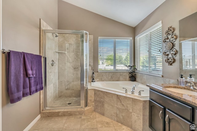 11743 S Silver Spur Ln, Draper, UT 84020 - full bathroom featuring lofted ceiling, a bath, vanity, a stall shower, and tile patterned flooring
