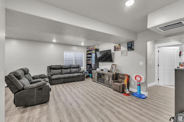 18616 Jefferson Ave, Eagle Mountain, UT 84013 - living area with wood finished floors, baseboards, and recessed lighting