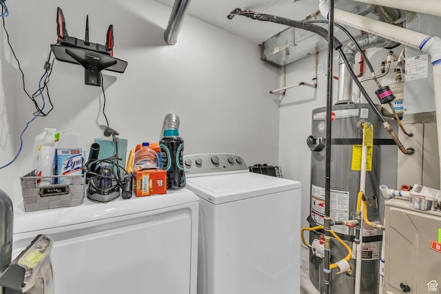 18616 Jefferson Ave, Eagle Mountain, UT 84013 - laundry room featuring washing machine and dryer and strapped water heater