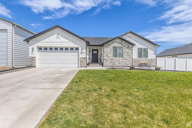 18616 Jefferson Ave, Eagle Mountain, UT 84013 - view of front of house featuring board and batten siding, stone siding, an attached garage, and concrete driveway
