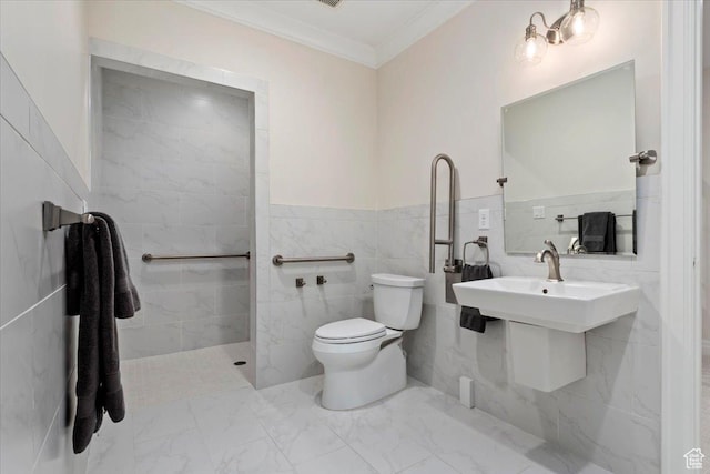4731 S Marabow Cir, Holladay, UT 84117 - bathroom with ornamental molding, toilet, marble finish flooring, tile walls, and a wainscoted wall