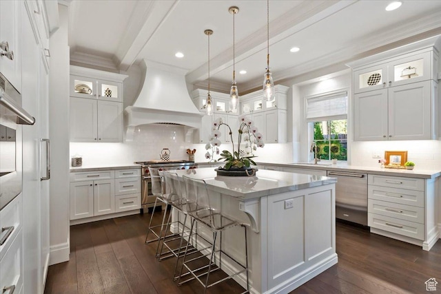 4731 S Marabow Cir, Holladay, UT 84117 - kitchen featuring appliances with stainless steel finishes, premium range hood, ornamental molding, white cabinetry, and recessed lighting