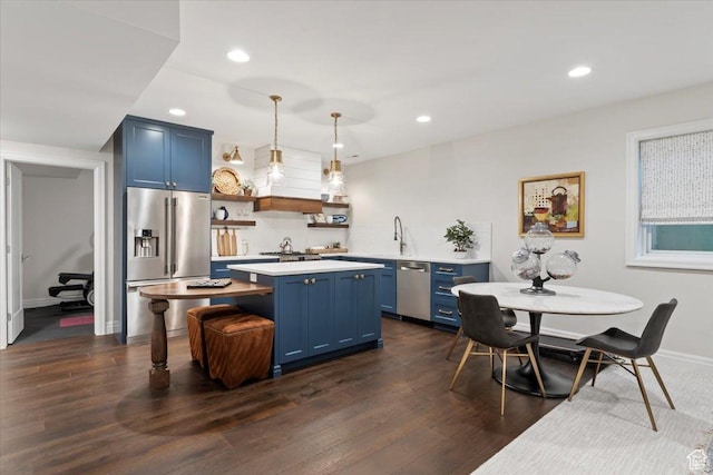 4731 S Marabow Cir, Holladay, UT 84117 - kitchen featuring appliances with stainless steel finishes, blue cabinets, light countertops, open shelves, and recessed lighting