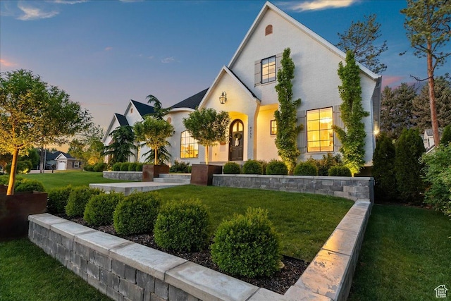 4731 S Marabow Cir, Holladay, UT 84117 - view of front of house with a front yard and stucco siding