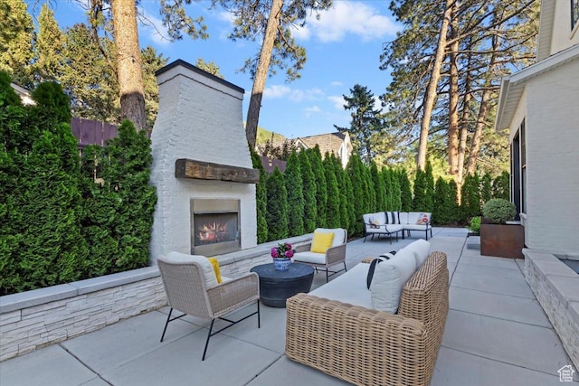 4731 S Marabow Cir, Holladay, UT 84117 - view of patio / terrace with an outdoor living space with a fireplace