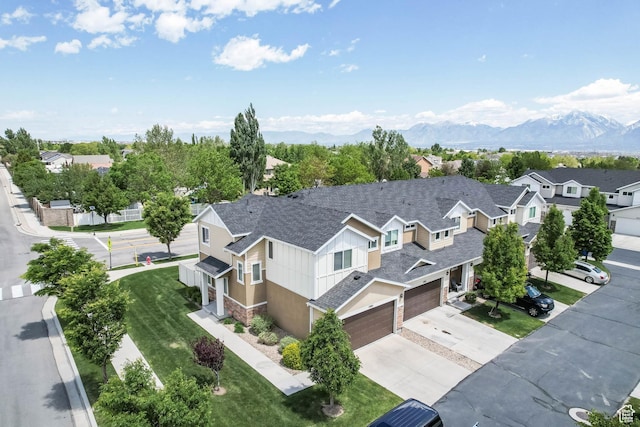 5564 W Baldrine Ct, Herriman, UT 84096 - aerial view of residential area featuring a mountainous background
