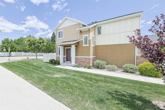 5564 W Baldrine Ct, Herriman, UT 84096 - view of front facade with board and batten siding and stone siding