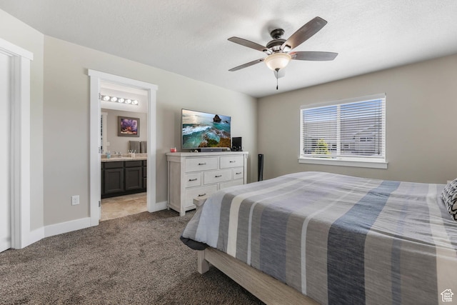 5564 W Baldrine Ct, Herriman, UT 84096 - carpeted bedroom with baseboards, connected bathroom, a textured ceiling, ceiling fan, and a sink