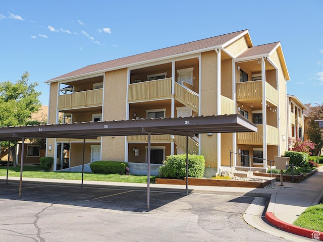 7208 S Station Creek Ln Unit 4B, Cottonwood Heights, UT 84047 - view of property with covered parking