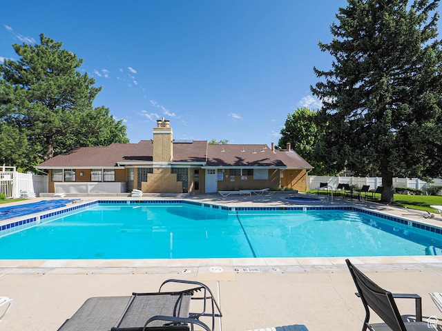7208 S Station Creek Ln Unit 4B, Cottonwood Heights, UT 84047 - community pool featuring a patio