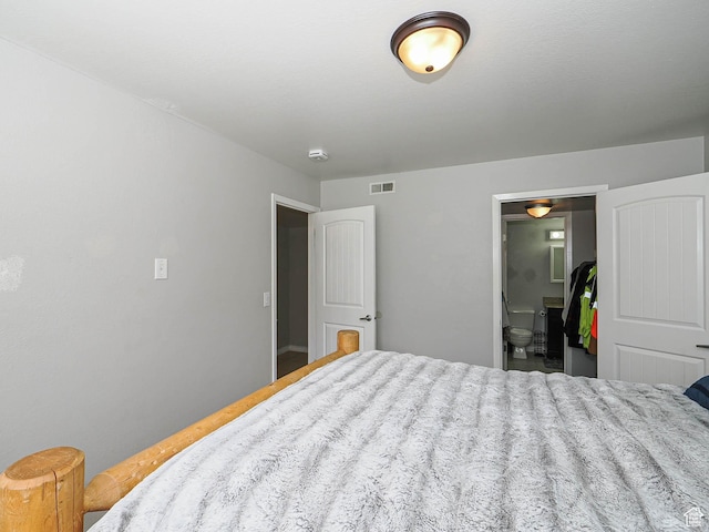 7208 S Station Creek Ln Unit 4B, Cottonwood Heights, UT 84047 - bedroom featuring ensuite bath and baseboards