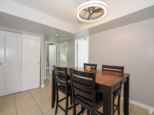 7208 S Station Creek Ln Unit 4B, Cottonwood Heights, UT 84047 - dining room with light tile patterned floors, baseboards, and ceiling fan