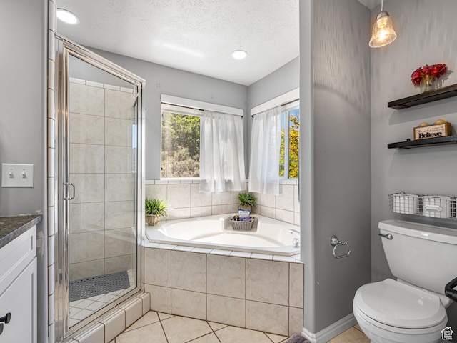 1152 E Gavin Cir, Draper, UT 84020 - full bath featuring a garden tub, a shower stall, tile patterned floors, toilet, and vanity