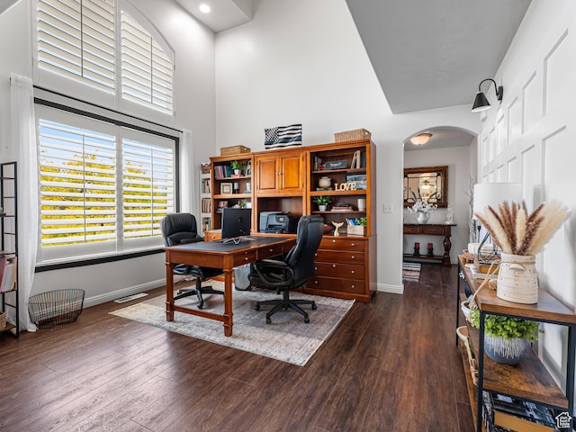 1152 E Gavin Cir, Draper, UT 84020 - office area with a towering ceiling, dark wood-type flooring, baseboards, arched walkways, and recessed lighting