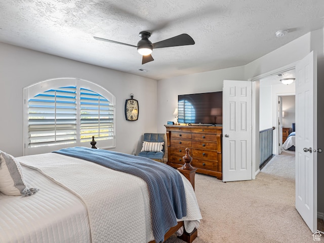 1152 E Gavin Cir, Draper, UT 84020 - bedroom featuring light colored carpet, a textured ceiling, and a ceiling fan