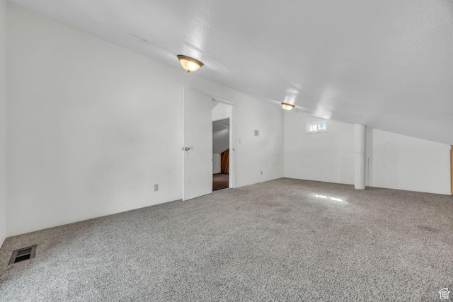 1054 E Lamplighter Dr, River Heights, UT 84321 - carpeted spare room featuring lofted ceiling