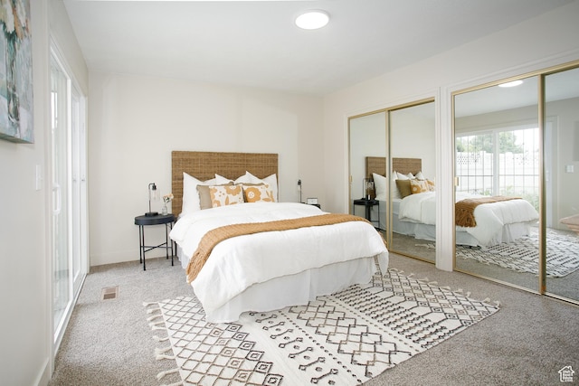 3644 S 860 E Unit 57, Salt Lake City, UT 84106 - carpeted bedroom featuring two closets