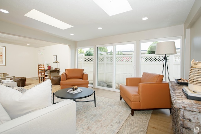 3644 S 860 E Unit 57, Salt Lake City, UT 84106 - living area with a skylight, light wood finished floors, and recessed lighting