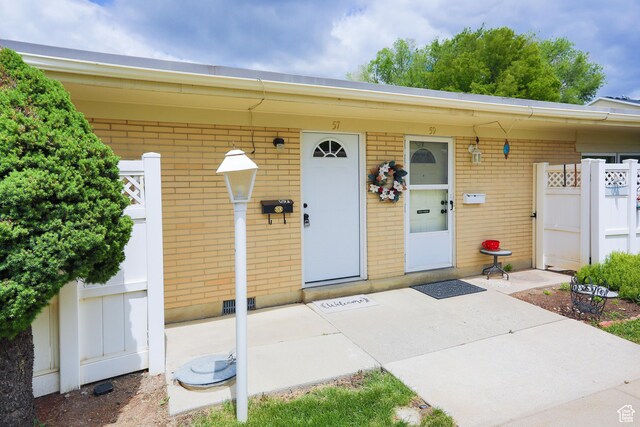 3644 S 860 E Unit 57, Salt Lake City, UT 84106 - view of exterior entry with brick siding