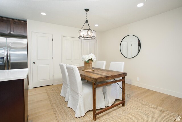 3644 S 860 E Unit 57, Salt Lake City, UT 84106 - dining area with light wood finished floors, a chandelier, baseboards, and recessed lighting