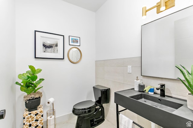 1620 W Brevia Ct Unit 25, Lehi, UT 84043 - half bathroom with vanity, tasteful backsplash, tile walls, and toilet