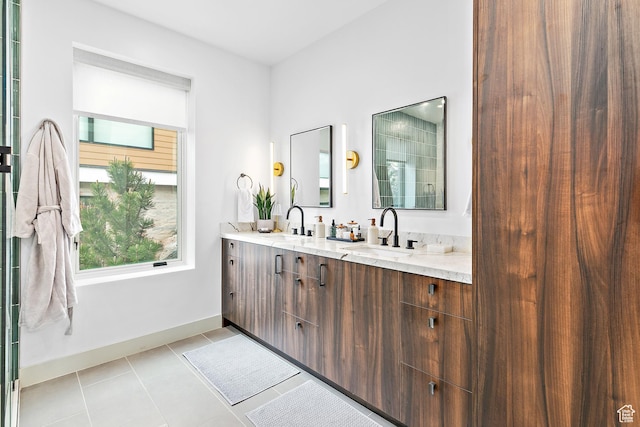 1620 W Brevia Ct Unit 25, Lehi, UT 84043 - bathroom with double vanity, baseboards, and tile patterned floors