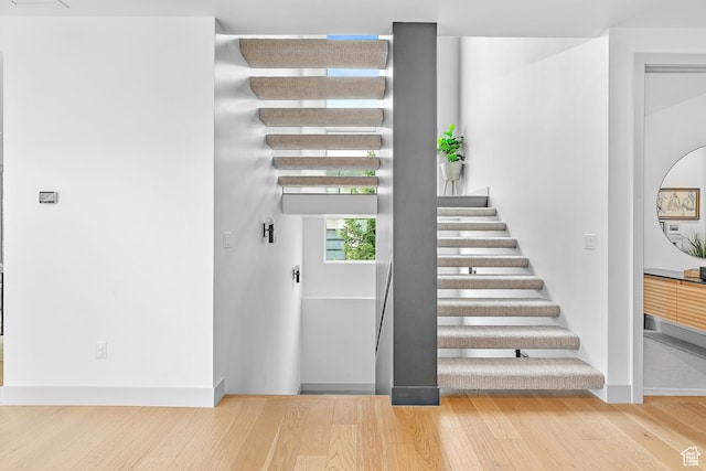 1620 W Brevia Ct Unit 25, Lehi, UT 84043 - stairs featuring wood finished floors and baseboards