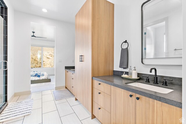 1620 W Brevia Ct Unit 25, Lehi, UT 84043 - bathroom with vanity, ensuite bath, ceiling fan, tile patterned floors, and recessed lighting