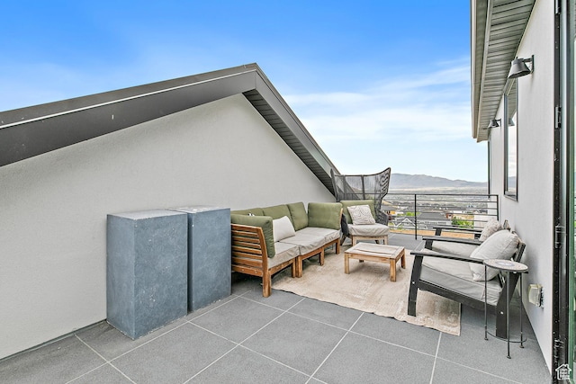 1620 W Brevia Ct Unit 25, Lehi, UT 84043 - view of patio / terrace with a balcony, a mountain view, and an outdoor hangout area