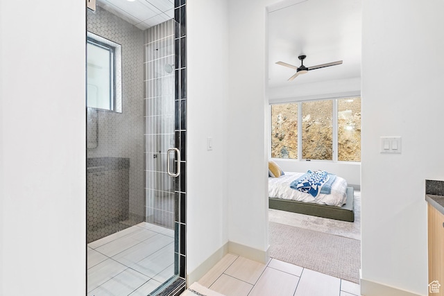 1620 W Brevia Ct Unit 25, Lehi, UT 84043 - full bath featuring a shower stall, tile patterned flooring, ceiling fan, vanity, and baseboards