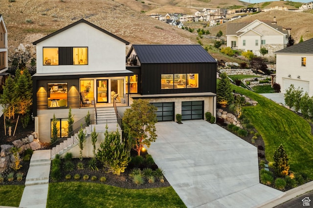 1620 W Brevia Ct Unit 25, Lehi, UT 84043 - view of front of property featuring stairs, driveway, and an attached garage