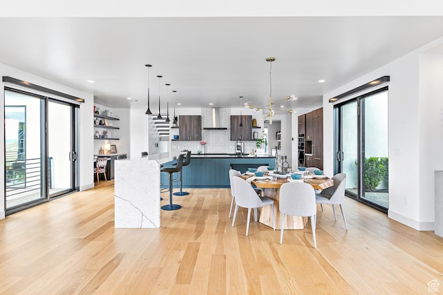 1620 W Brevia Ct Unit 25, Lehi, UT 84043 - dining space featuring light wood finished floors, recessed lighting, and baseboards
