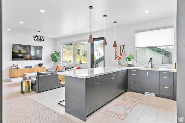 1620 W Brevia Ct Unit 25, Lehi, UT 84043 - kitchen with a sink, gray cabinets, a peninsula, recessed lighting, and light countertops