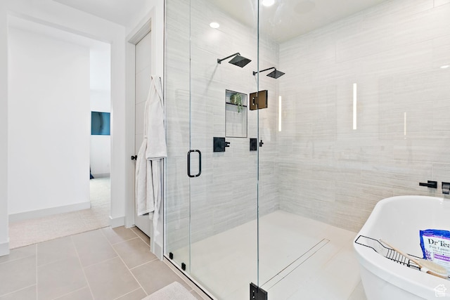 1620 W Brevia Ct Unit 25, Lehi, UT 84043 - full bathroom featuring a stall shower, a soaking tub, and tile patterned floors