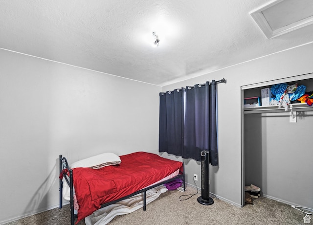 444 E 670 N, Tooele, UT 84074 - carpeted bedroom featuring a textured ceiling, attic access, baseboards, and a closet