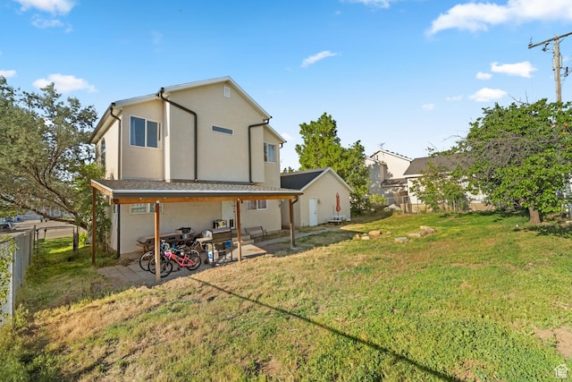 444 E 670 N, Tooele, UT 84074 - back of property featuring a patio and stucco siding