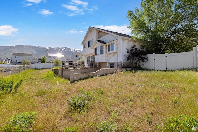 1367 E 3125 N, Layton, UT 84040 - rear view of property with a mountain view