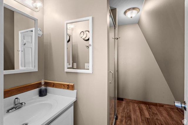 10246 E Lake Pines Dr Unit 1020, Heber City, UT 84032 - full bath featuring vanity, wood finished floors, and a shower stall