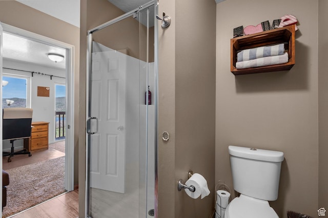 10246 E Lake Pines Dr Unit 1020, Heber City, UT 84032 - full bath with a shower stall, toilet, and wood finished floors