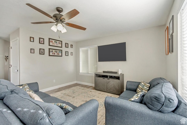 3864 E Cascade Rd, Eagle Mountain, UT 84005 - living area featuring ceiling fan, wood finished floors, baseboards, and healthy amount of natural light