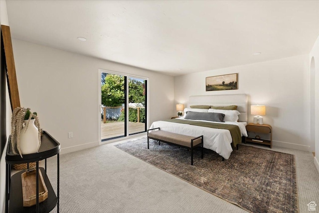 2559 E Evening Star Dr, Holladay, UT 84124 - carpeted bedroom with access to exterior and baseboards