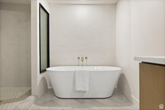 2559 E Evening Star Dr, Holladay, UT 84124 - full bath featuring a freestanding tub, walk in shower, and tile patterned floors