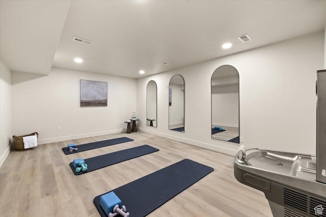 2559 E Evening Star Dr, Holladay, UT 84124 - exercise area with recessed lighting, wood finished floors, and baseboards