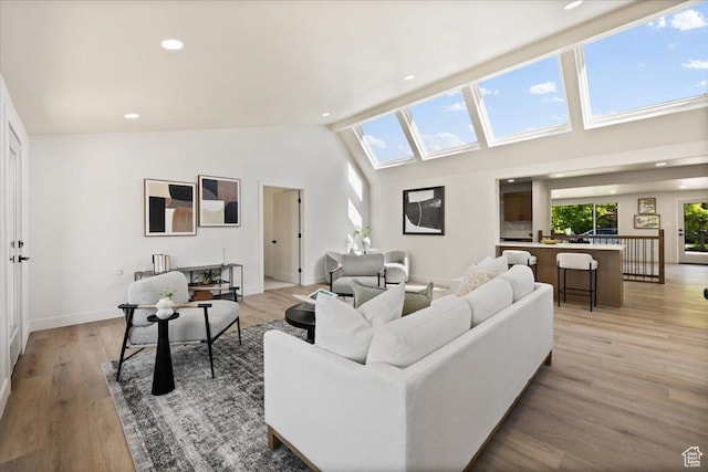 2559 E Evening Star Dr, Holladay, UT 84124 - living room featuring light wood finished floors, baseboards, recessed lighting, and high vaulted ceiling