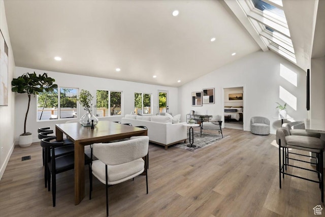 2559 E Evening Star Dr, Holladay, UT 84124 - living area featuring recessed lighting, light wood-style flooring, baseboards, and high vaulted ceiling
