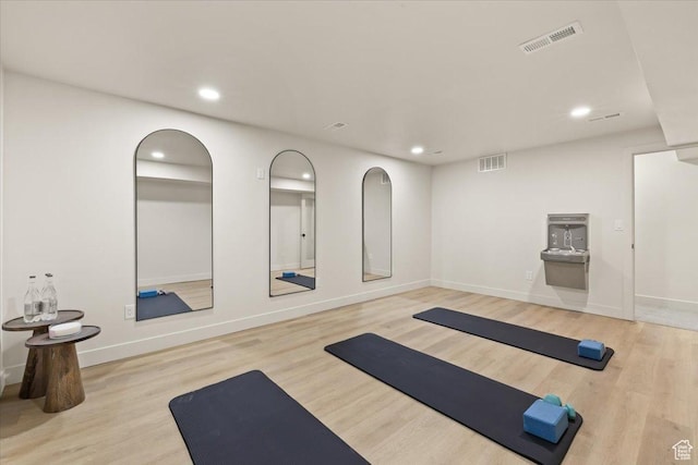 2559 E Evening Star Dr, Holladay, UT 84124 - workout area featuring recessed lighting, wood finished floors, and baseboards