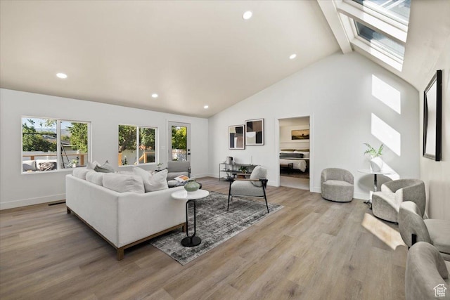 2559 E Evening Star Dr, Holladay, UT 84124 - living room with healthy amount of natural light, light wood-type flooring, recessed lighting, high vaulted ceiling, and baseboards