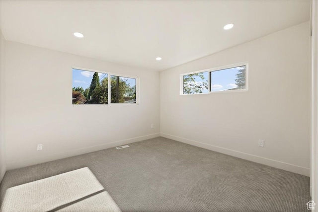 2559 E Evening Star Dr, Holladay, UT 84124 - empty room featuring healthy amount of natural light, carpet flooring, recessed lighting, and baseboards