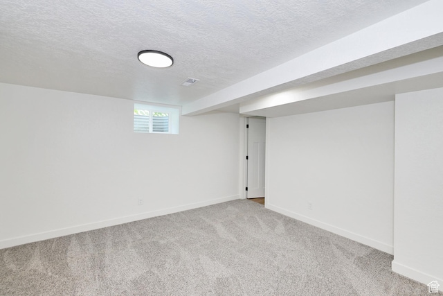 4673 W 5255 S, Kearns, UT 84118 - basement with baseboards, carpet flooring, and a textured ceiling